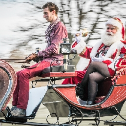 the real Santa Claus with driving sleigh