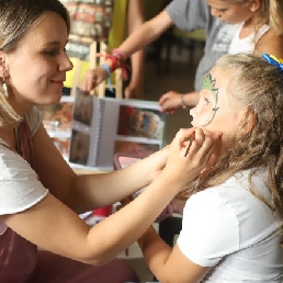 Face painting children's party and glitter tattoo
