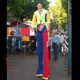 Clown on stilts