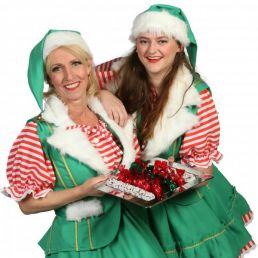 Kerst Vrouwtjes Delen Kerstkransjes Uit