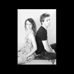 Kerstoptreden zang piano en orkestband