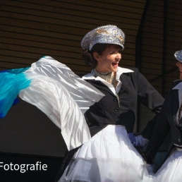 Parade stilt walkers (conductor outfit)