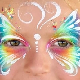 Priscilla's face painting and glitter tattoos