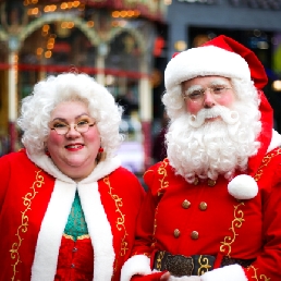 Singing Santa and Woman