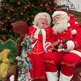Singing Santa and Woman