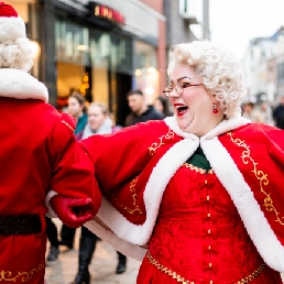 Singing Santa and Christmas Woman