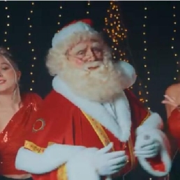 Nicolas the Santa Claus and the Santa singers