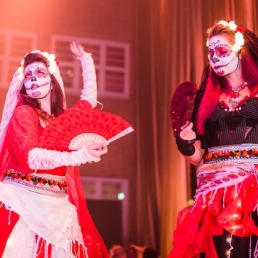 Dias de los muertos stilt walkers