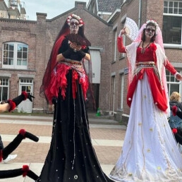 Dias de los muertos stilt walkers