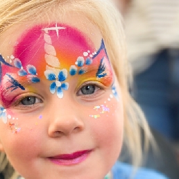 Colorful face paint with Drops & Dots