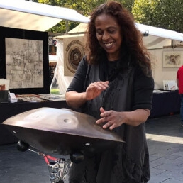 Groovy Handpan Player a 1 woman act