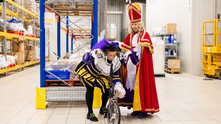 Female St. Nicholas with head priest