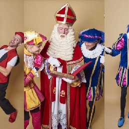 St. Nicholas and his helpers hand out