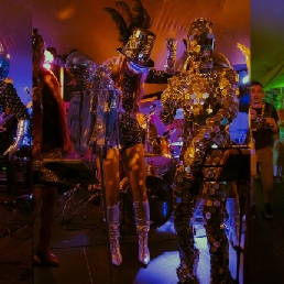 Festival act mirror costume dancers