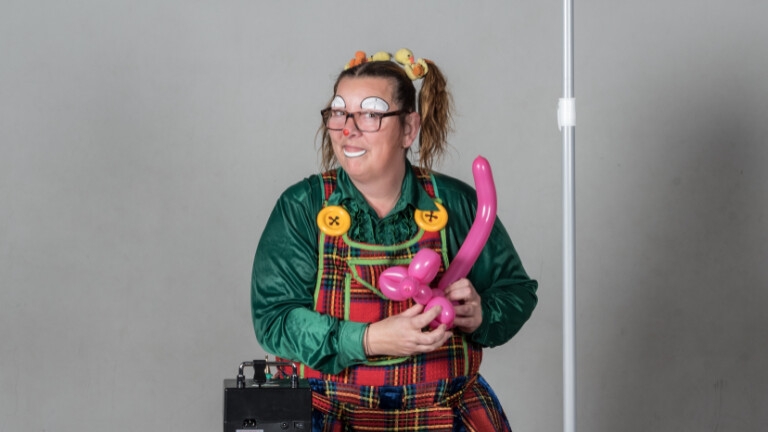 Balloon clown + popcorn handout fun