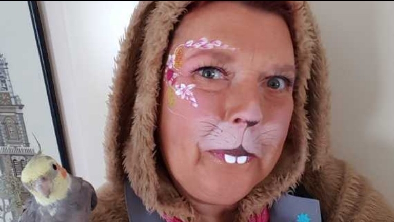 The face painting Easter Bunny
